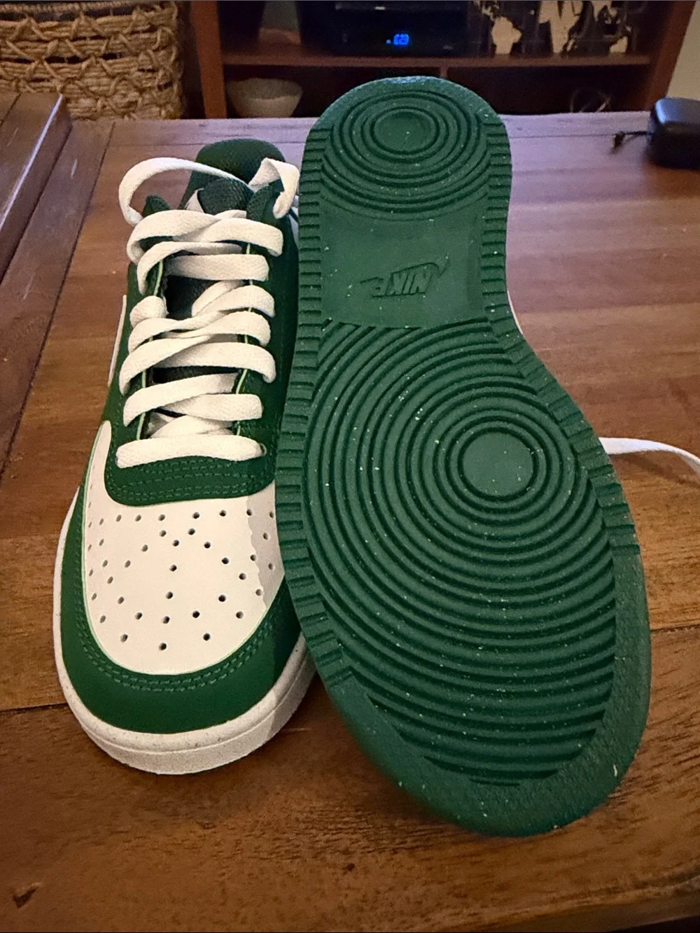 Nike White and Green Low-Top Sneakers — Classic Swoosh Design
